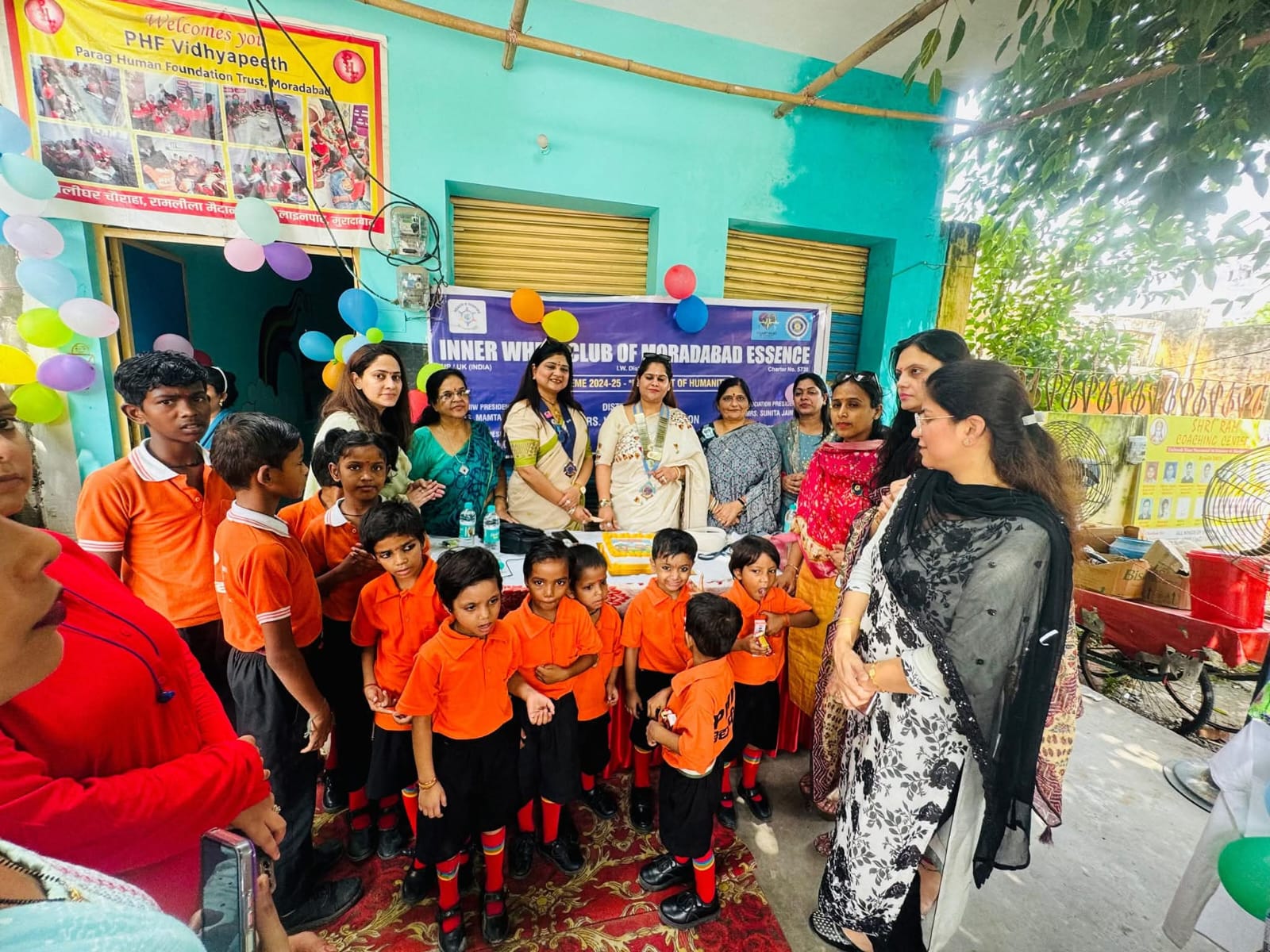 Inner Wheel Club group meeting at the PHF Vidhyapeeth center entrance